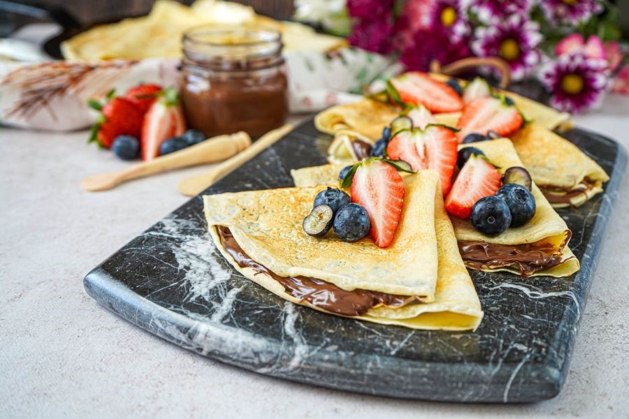 Vào năm mới, bánh Pfannkuchen tượng trưng cho những điều may mắn